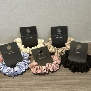 Set di 5 eleganti elastici per capelli in raso nei colori crema blu e nero