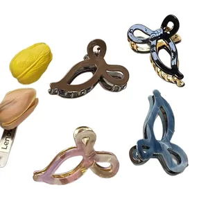 Pinces à cheveux en acétate motif nœud en quatre couleurs avec ressort métallique