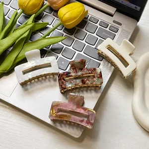 Set of four French minimalist rectangular hair claws in pearl white and tortoiseshell