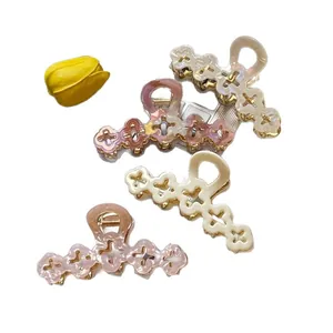 Elegant four-piece floral hair claw clip set in cream white and marbled pink purple finish