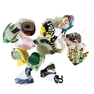 Marine series acetate claw clips featuring ocean animals and insects on white background