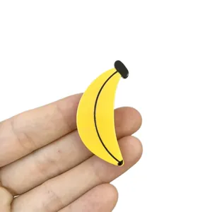 Pince à cheveux banane unique en acétate de cellulose avec finition jaune et détails noirs