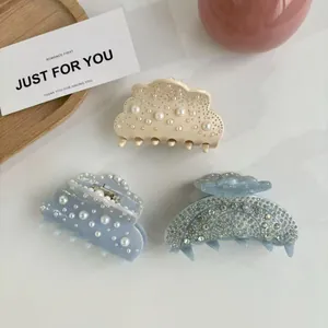 Trois pinces à cheveux élégantes avec perles et strass en tons crème et bleu