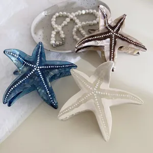 Pinces à cheveux étoile de mer en acétate bleu marine, crème et écaille de tortue à pois