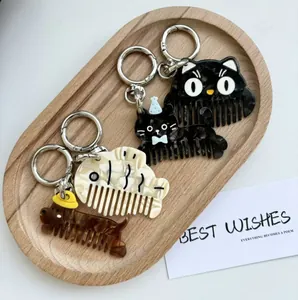 Chic acetate hair comb keychains in cute cartoon animal shapes with marble texture finish
