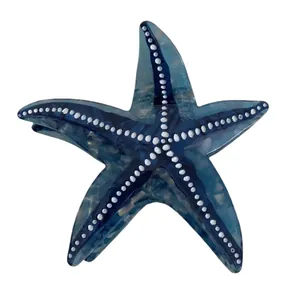 Pince à cheveux élégante en acétate, forme étoile de mer bleue marbrée à pois blancs