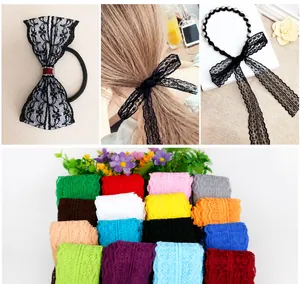 Detailed view of 45mm lace trim rolls and elegant handmade hair accessories in various colors