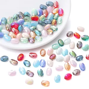 Macro shot of colorful faceted oval glass beads for DIY jewelry making and necklaces