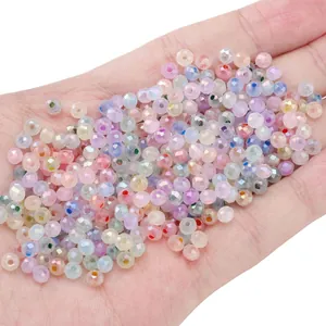 Macro shot of 4mm faceted iridescent glass beads in pastel colors for DIY jewelry making