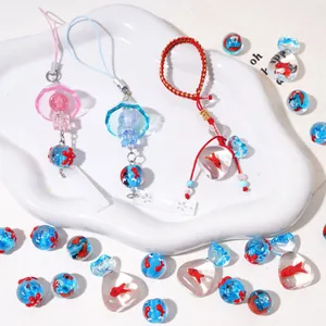 Pendentifs japonais en verre faits main avec étoiles de mer, baleines et perles