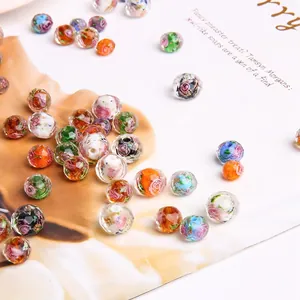 Faceted glass rondelle beads with inner rose floral patterns for DIY jewelry making