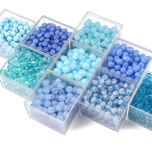 Blue glass beads collection in acrylic boxes for DIY bracelet and jewelry making
