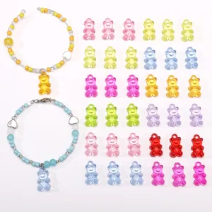 DIY jewelry set featuring colorful acrylic bear charms and matching beaded bracelets