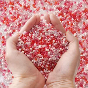 Mix of red and white glass seed beads for DIY jewelry and handmade bracelets