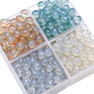 Mix of colorful round glass beads for DIY jewelry making in a transparent storage box