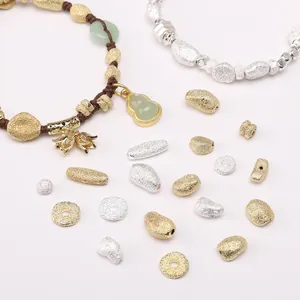 Matte gold and silver copper beads set with a braided bracelet and beaded jewelry