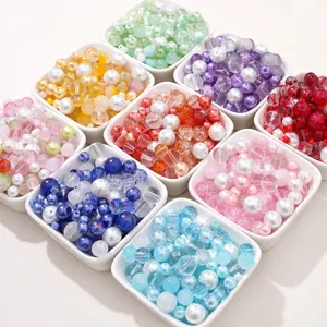 DIY mixed glass pearl and round beads in porcelain bowls for handmade jewelry making