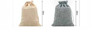 Detail view of linen drawstring pouches with 18cm and 20cm height measurements