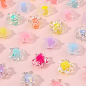 Colorful star and flower acrylic beads for DIY jewelry making in pastel aurora finishes