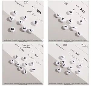 Close-up of 4x7mm white acrylic letter beads E F G H with 1.5mm holes for DIY jewelry