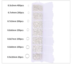 DIY jewelry kit with silver open jump rings in a 7-grid plastic storage box organizer