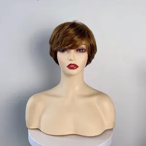 Front view of short reddish brown layered wig with wispy bangs on a mannequin head