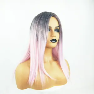 Detail view of long straight ombre wig with dark roots transitioning to soft pink hair
