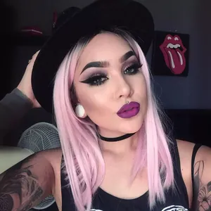 Long straight ombre pink wig with middle part styling and black fedora fashion hat