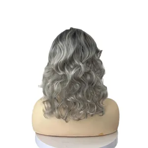 Short wavy silver gray wig for women featuring natural loose curls and volume