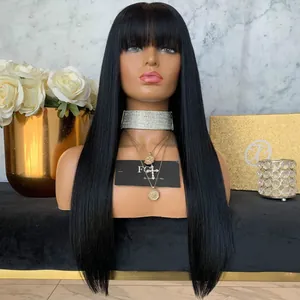 Close-up of black long straight wig with bangs on a model head with luxury decor