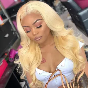 Long wavy blonde synthetic wig for women with middle part and natural light golden curls