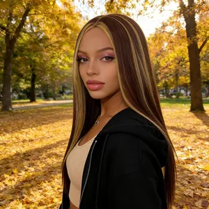 Detailed outdoor shot of 24-inch long straight wig with dark brown and blonde highlights