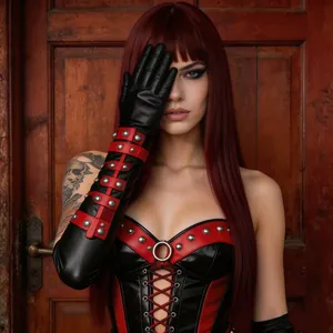Detail of gothic corset with silver studs, metal rings and red lace-up synthetic leather