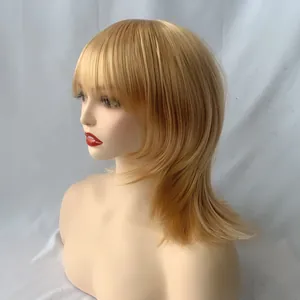 Side view of light blonde medium hair wig with bangs and layered flipped ends