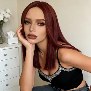 Long burgundy straight synthetic wig with middle part for women in a natural home setting