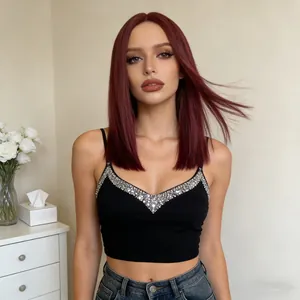Detail of dark wine red long straight wig with a middle part on a female model