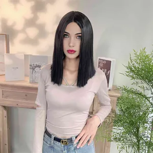 Close-up of sleek black mid-length straight bob wig with center part styling on model