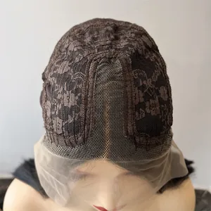 Detailed view of breathable lace wig cap structure with skin-tone mesh on mannequin