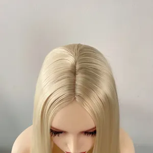 Close-up of realistic scalp detail and middle part on light blonde long straight wig
