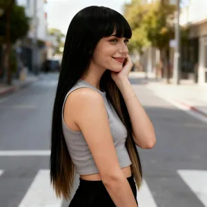 Outdoor shot of long straight ombre black to brown wig with blunt bangs and natural texture