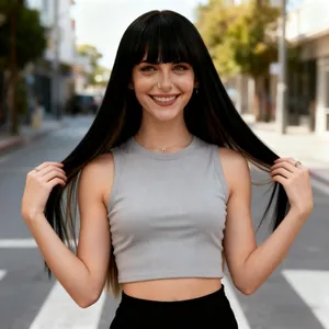 Long straight black synthetic wig with flat bangs on a model in urban background