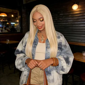 Close-up of long straight light blonde wig with natural shine in trendy street style look
