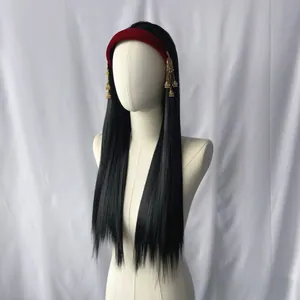 Close-up of a long black straight wig with a red velvet headband and gold tassels