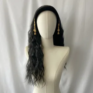 Long wavy black wig with integrated velvet headband and gold jhumka pendant earrings