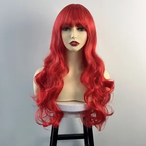 Detail of vibrant red long wavy synthetic wig with full air bangs on a display head