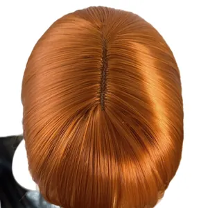 Top view of ginger copper synthetic long straight wig with realistic middle part scalp