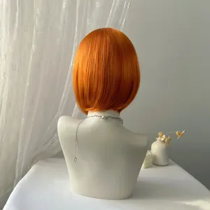 Macro detail of the bright orange short bob wig back view with smooth hair texture