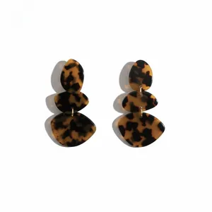 Three-layer tortoiseshell acetate drop earrings in geometric organic shapes