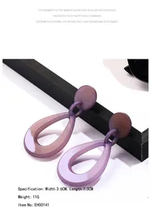 Detail view of purple marble acrylic teardrop earrings showing 3.6cm by 7.3cm dimensions
