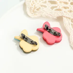 Acrylic flower brooch set in pink and cream beige with long metal pins for suits